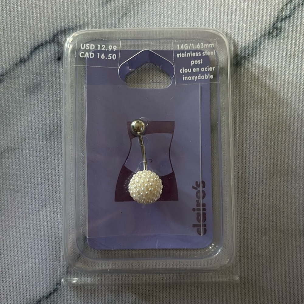 Claire’s belly button ring